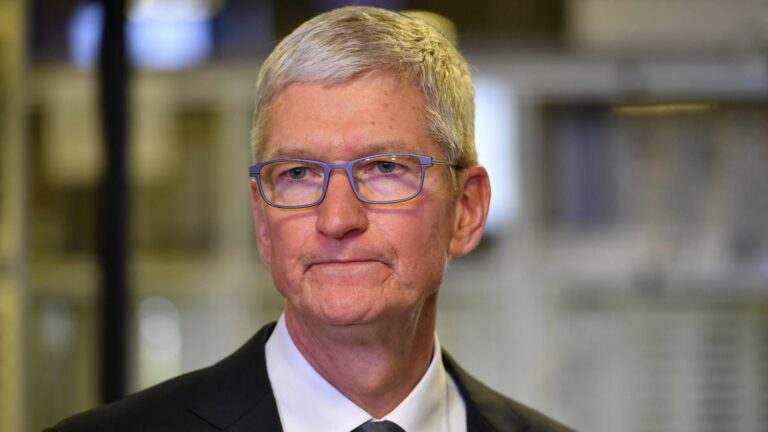 Tim Cook looking pensive in a suit