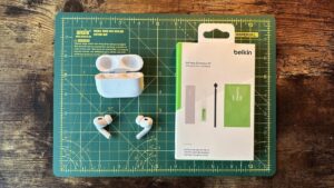 Belkins AirPods cleaning kit, with AirPods Pros and parts exposed.