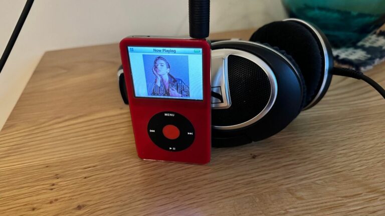 iPod Video stood up against some headphones