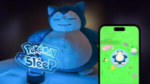 Snorlax stuffed animal with Pokémon Sleep app.