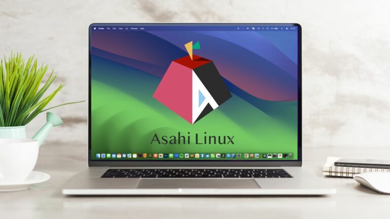 Asahi Linux Fedora logo on MacBook Pro