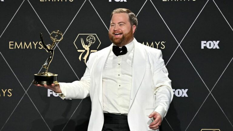 US actor Paul Walter Hauser poses in the press room with the Outstanding Supporting Actor in a Limited/Anthology Series or Movie award for