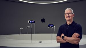 Tim Cook standing in front of the Vision Pro headset